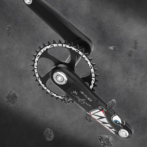 Black crankset with logos on bike showing Dual Pack Mountain Bike Frame Protectors Stickers For Crankset And Handlebar One Pair 14 By 5.5 Cm