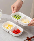 Set Of Two Divided Ceramic Dip Bowls With Stainless Steel Rims Zero Fuss Layout For Soy Sauce Vinaigrettes And Spice Mixes, holding toppings.