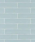 Pattern of Chester Acqua 2x10 Ceramic Wall Tile with slick gloss finish, aqua tone, ideal for accent walls and backsplashes in modern homes.