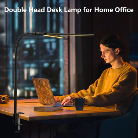 Person working at desk with Double Head LED Desk Lamp For Home Office And Studio, Ultra Wide 25.1 Inch Light Bar, 1200LM lighting.