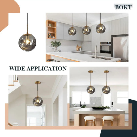 Brass Gold Globe Pendant Light Lit With Smoke Gray Glass Shade Mid Century Modern Ceiling Hanging Fixture in kitchen and dining