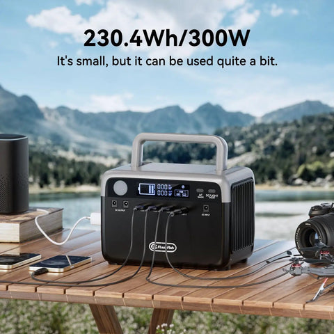 Portable Solar Generator With 60 Watt Panel And 230 Wh LifePo4 Battery Power Station Charges Up To Seven Devices, compact design on wooden table.