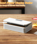 Mini Bag Sealer 2 In 1 Heat Sealer And Cutter With Rechargeable Battery And LED Display on wooden table with snacks.