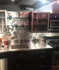 Modern kitchen with Peel And Stick Metal Backsplash Panels 12 By 12 Inch Square, 10 Piece Puzzle Set In Silver, Dry Install No Mess.