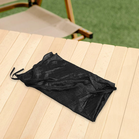 Black fabric fold of Backyard Trampoline Tent Canopy With Poles UV Protection Shade Cover Rainproof on wood table