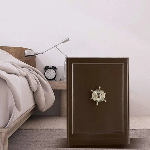 Compact Home Safe Box For Personal Valuables Made From Steel With Shock Proof Construction Perfect For Cash Passport Jewelry And Documents In Cabinets Or Under Bed next to a bed.