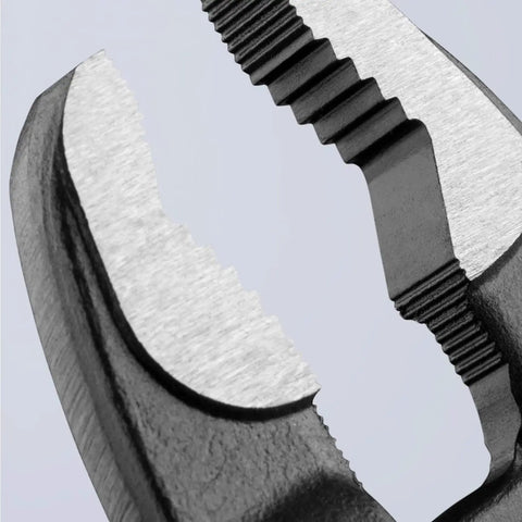 Close-up of the jaws on 12 Inch Water Pump Pliers With Quick Button Adjustment On The Workpiece Fine Jaw Tuning For Different Sized Pieces