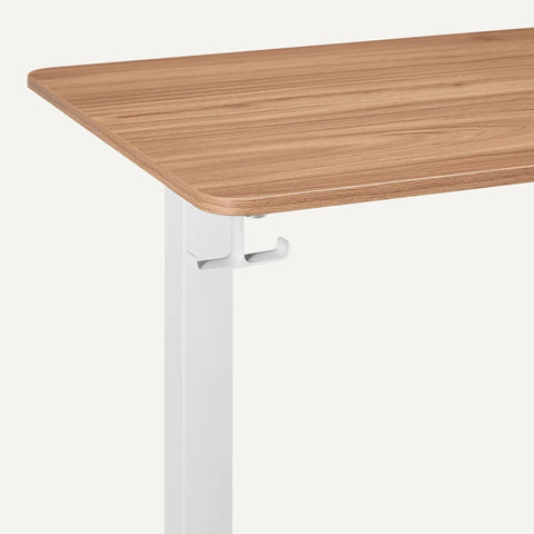 Electric Standing Desk With Quiet Motor And Multiple Presets White And Oak Finish corner detail with large work surface for home office.