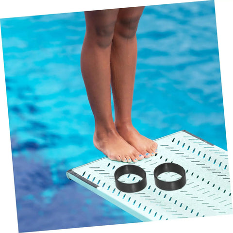 Two rubber fixing bands on a diving board with water background, part of Diving Fixing Bands 5 Pieces 1.25In Elastic Rubber Straps.