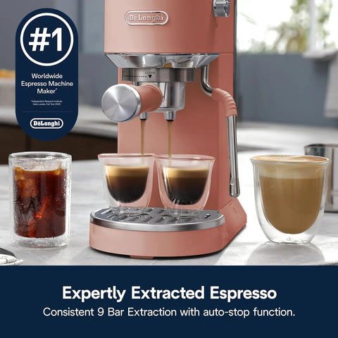 Compact Espresso Machine And Cold Brew Coffee Maker With Automatic Milk Frother Wand For Next Level Hot Iced Coffee Crafts And Dope Daily Sips In Sleek Rose Pink brewing two espressos with a cold brew drink nearby.