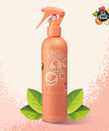 Hassle Free Dry Dog Shampoo Peach Scent Spot Wash For Pooches On The Go Natural Oil Blend Fast Drying Deodorizing Spray in a spray bottle.