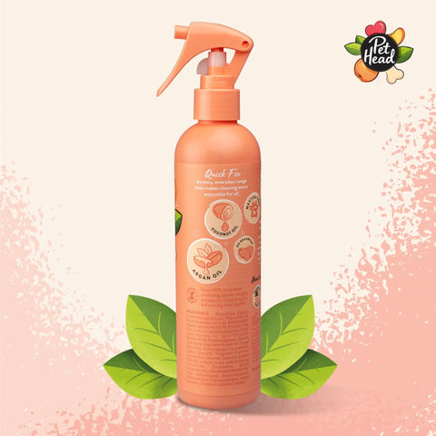 Hassle Free Dry Dog Shampoo Peach Scent Spot Wash For Pooches On The Go Natural Oil Blend Fast Drying Deodorizing Spray in a spray bottle.