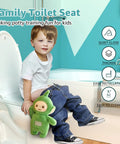 Child sitting on Elongated Toilet Seat With Built In Toddler Seat Kid Friendly Potty Training Ready Slow Close Lid Quick Release