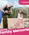 Family using Kids Fishing Pole And Reel Combo Starter Set with pink rod and tackle box by the water, enjoying an outdoor activity.