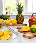 Pineapple Eye Peeler And Remover Tool Set with V Shape Stainless Steel Blades on kitchen counter with assorted fruits