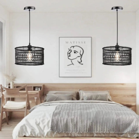 Two Boho Rattan Chandelier Pendant Lights in bedroom, handwoven Burmese rattan, black finish, casting warm 360 degree shadows.
