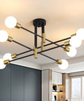 Starburst Inspired Eight Light Pendant Chandelier In Black Finish Mid Century Modern Nordic Ceiling Light installed in living room