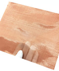 Heavy Duty Pure Copper Mesh Sheet 9.8 By 9.8 Inch 200 Mesh Dense Filter Screen held in hand on white backdrop focusing on weave texture