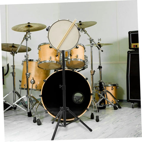 Heavy Duty Adjustable Snare Drum Rack In Matte Black With Telescopic Height Settings And Foldable Portability For Local Jam Nights Or No Sweat Travel Setup, holding a snare drum.