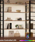 Sixty Five X Fifty L Shaped Bookshelf With Five Tier LED Accent Lighting showcasing open compartments and decorative items.