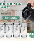 Portable Stainless Steel Electric Kettle 0.8L Mini Hot Water Boiler pouring into glasses, showing capacity.