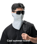Person wearing grey Summer Cooling Balaclava Face Mask For Men And Women All Day Comfort With UV Sun Protection Ideal For Cycling Skiing Hiking