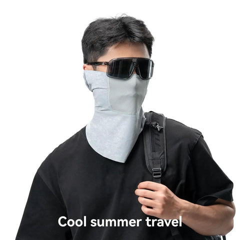 Person wearing grey Summer Cooling Balaclava Face Mask For Men And Women All Day Comfort With UV Sun Protection Ideal For Cycling Skiing Hiking