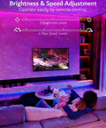 Room with Dinosaur Eggs Galaxy Star Projector creating nebula effect, showing brightness and speed adjustments on remote control.