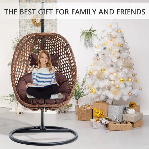 Child sitting in egg chair with stand for indoor and outdoor relaxation, premium hanging swing chair with thick cushion and headrest.