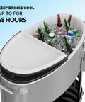 70-Quart Rolling Patio Cooler With Wheels Insulated Ice Chest For Outdoor Barbecues Pool Parties Camping And Beach Trips With Bottom Storage Tray And Bottle Opener Gray filled with ice and drinks