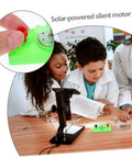 Children explore Solar Powered Science Experiment Kit For Kids with mini generator motors and turbine, emphasizing STEM learning.