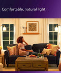 Living room with 8 Pack LED A19 Light Bulbs 40W Equivalent Soft White 2200K Ultra Definition 95 CRI, creating a cozy ambiance.