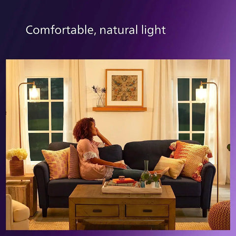 Living room with 8 Pack LED A19 Light Bulbs 40W Equivalent Soft White 2200K Ultra Definition 95 CRI, creating a cozy ambiance.