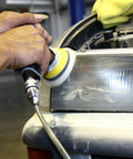 These 3 Inch Wool Buffing Pads Lock Right Onto Your Buffer In Seconds, Soft Polishing Pads For Car Detailing And Furniture Refinishing, Dense Scrubbing Wheels Built To Crush Tough Marks And Serve Up That Pristine Paint Job Zero Hassle in use on a car light.