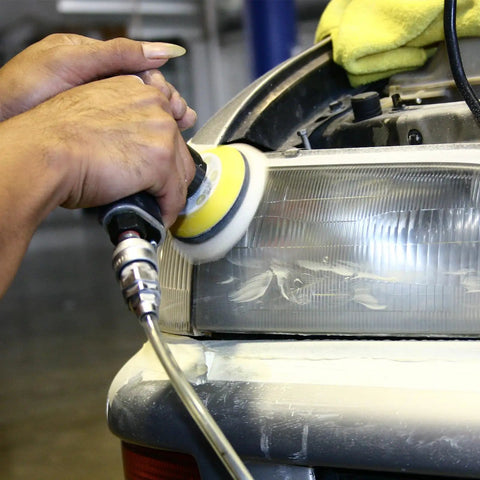 These 3 Inch Wool Buffing Pads Lock Right Onto Your Buffer In Seconds, Soft Polishing Pads For Car Detailing And Furniture Refinishing, Dense Scrubbing Wheels Built To Crush Tough Marks And Serve Up That Pristine Paint Job Zero Hassle in use on a car light.