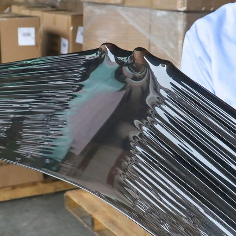 Close-up of Heavy Duty Black Stretch Wrap 1500 Ft Roll, showing shrink film texture for pallet wrapping and moving.