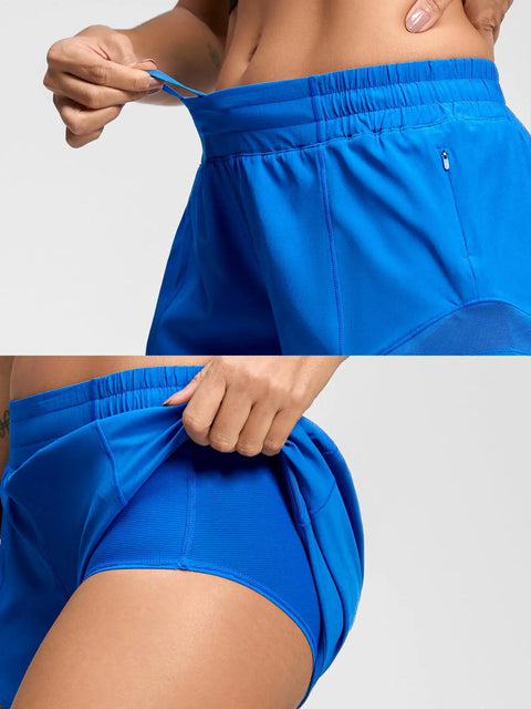 Close-up of Women's Low Rise 2.5 Inch Running Shorts With Built In Liner No Chafe Quick Dry, showing elastic waistband and zip pocket detail.