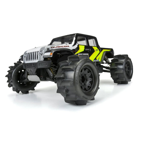 RC car with Belted 2.8 Inch Sand Paw HP Paddle Tires on Raid Black 6x30 Wheels with removable hex, for sand drag racing.