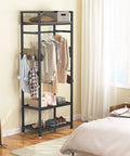 Robust Set Of 10 Heavy Duty Clothes Rack With Shelf And Hanging Rod in compact bedroom with clothes, shoes, and storage baskets.