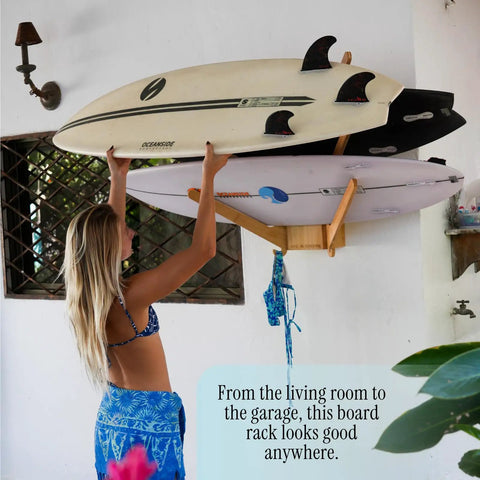The Sun Rack Premium Bamboo Wall Mount For Surfboards Snowboards Skis And Wakeboards Holds Four Boards With Built In Drawer And Hooks For Garage And Home Storage Dope Space Saving Display And Organization featuring surfboards in a home setting