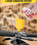 Brake Bleed Kit For Shimano TeKTro TRP Hydraulic Disc Brakes With 120 ML Mineral Oil Fluid And Funnel in use