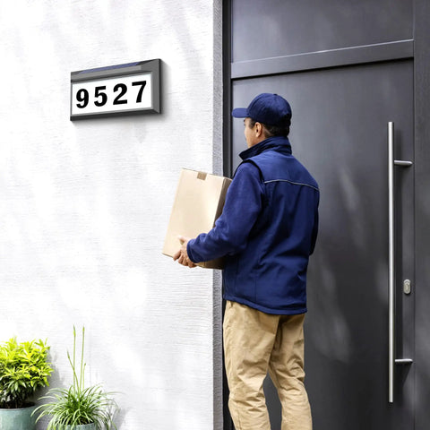 Courier delivering package to house with Solar Powered Address Sign With Bright LED House Numbers, Outdoor Waterproof Plaque