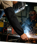 Premium Heat Resistant Welding Arm Sleeves Flame Retardant Cotton Guards With A Snug Elastic Fit Built Tough For Rough Job Sites And Heavy Duty Mechanic Work One Black Pair being used in welding.