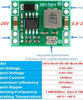 Close-up of a Six Pack MP1584EN Buck Converter Module with input-output labels and specs table, showing adjustable potentiometer.