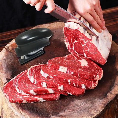 Meat Tenderizer With 48 Stainless Steel Needle Blades Heavy Duty Pro Grade Kitchen Tool next to sliced beef on cutting board