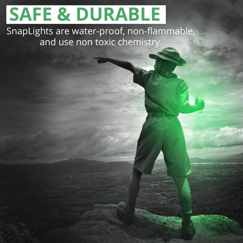 Outdoor adventurer holding Beefed Up Military Grade Green Glow Sticks 6 Inch Snap Light Emergency Chemical Light 12 Hour Duration 10 Pack For Outdoors Travel Power Outages And Survival Kits.