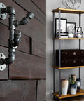 Wall-mounted five way side exit cross cast iron pipe fitting, three quarters inch angle connector for vintage style shelves.