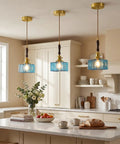 BBLLWJ 1-Pack Vintage Pendant Light for Kitchen Island, Brass & Wood Hanging Fixture with 78" Adjustable Cord, Blue Rectangular Hammered Glass Ceiling Light for Dining Room, Sink, Bedroom in kitchen ambiance.
