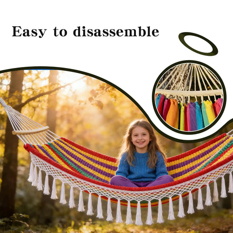 Girl sitting on colorful hammock with fringe, featuring an easy-to-disassemble design and close-up of spreader bars in forest setting.