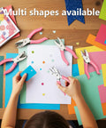 Child using Mini Hole Punch Set 5 In 1 with Heart Star and Circle Punches for paper crafts and DIY projects on colorful paper.